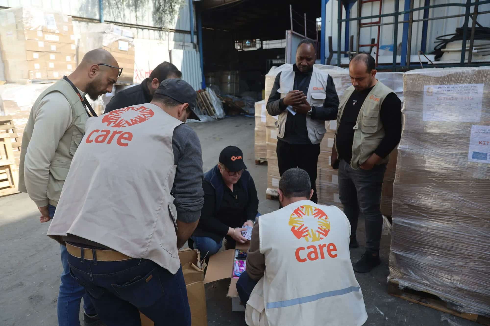 Local CARE teams checking relief supplies in Gaza
